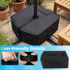 Sand-fillable umbrella base weight in black with adjustable fixing strap and convenient carry handles for easy.