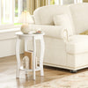Round white end table with storage shelf, featuring rubber wood legs, ideal for living room or bedroom decor.