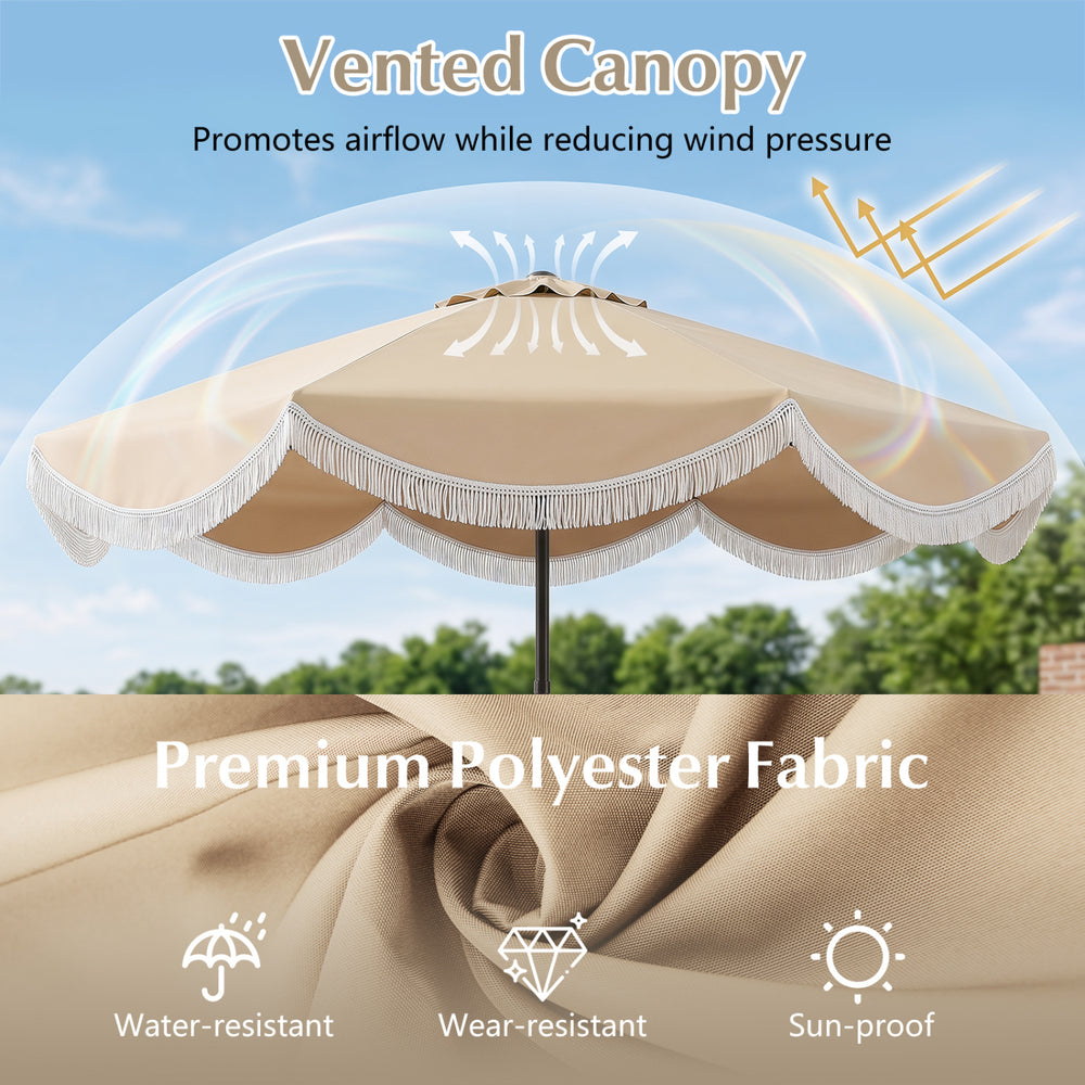 Vented canopy of a 9/10 FT outdoor tassel umbrella in beige, made of premium polyester fabric for sun protection.