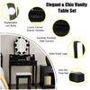 Black makeup dressing table with lighted mirror, cushioned stool, and four drawers for ample cosmetic storage.
