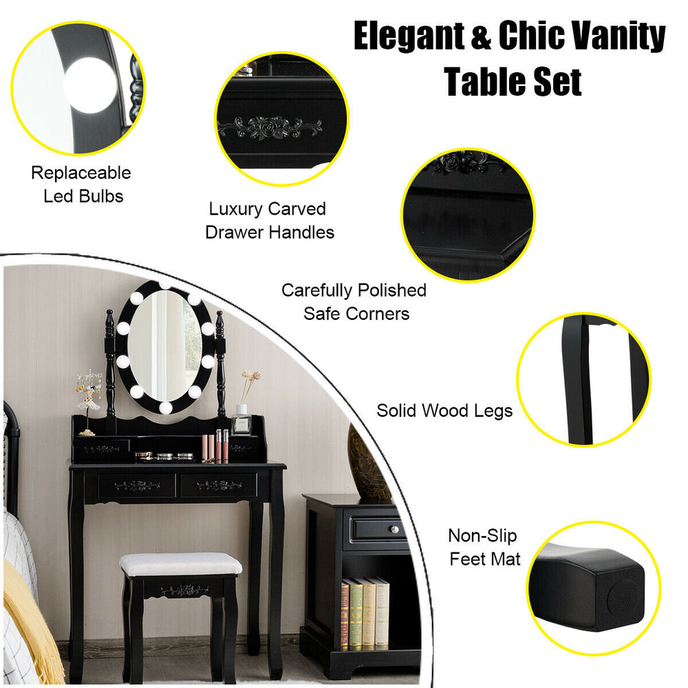 Black makeup dressing table with lighted mirror, cushioned stool, and four drawers for ample cosmetic storage.
