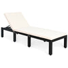 Height-adjustable patio rattan lounge chair with soft white cushion, perfect for poolside or outdoor relaxation.