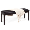 Brown PU upholstered dining bench with button tufting, sturdy rubber wood legs, perfect for resting in any room.