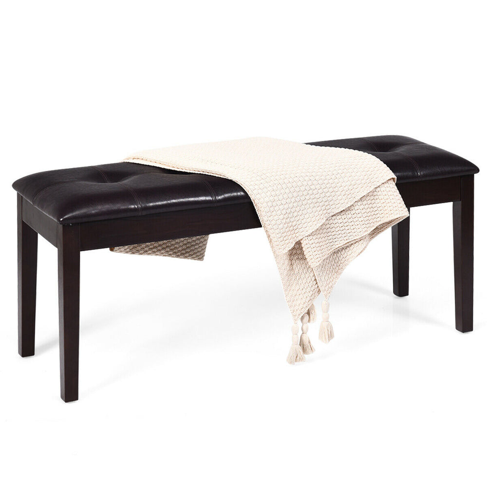 Brown PU upholstered dining bench with button tufting, sturdy rubber wood legs, perfect for resting in any room.