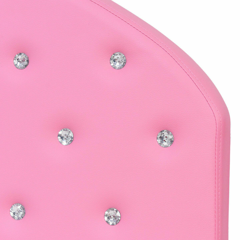 Close-up of the pink upholstered headboard with crystal accents, designed for a twin size toddler bed for safe sleeping.