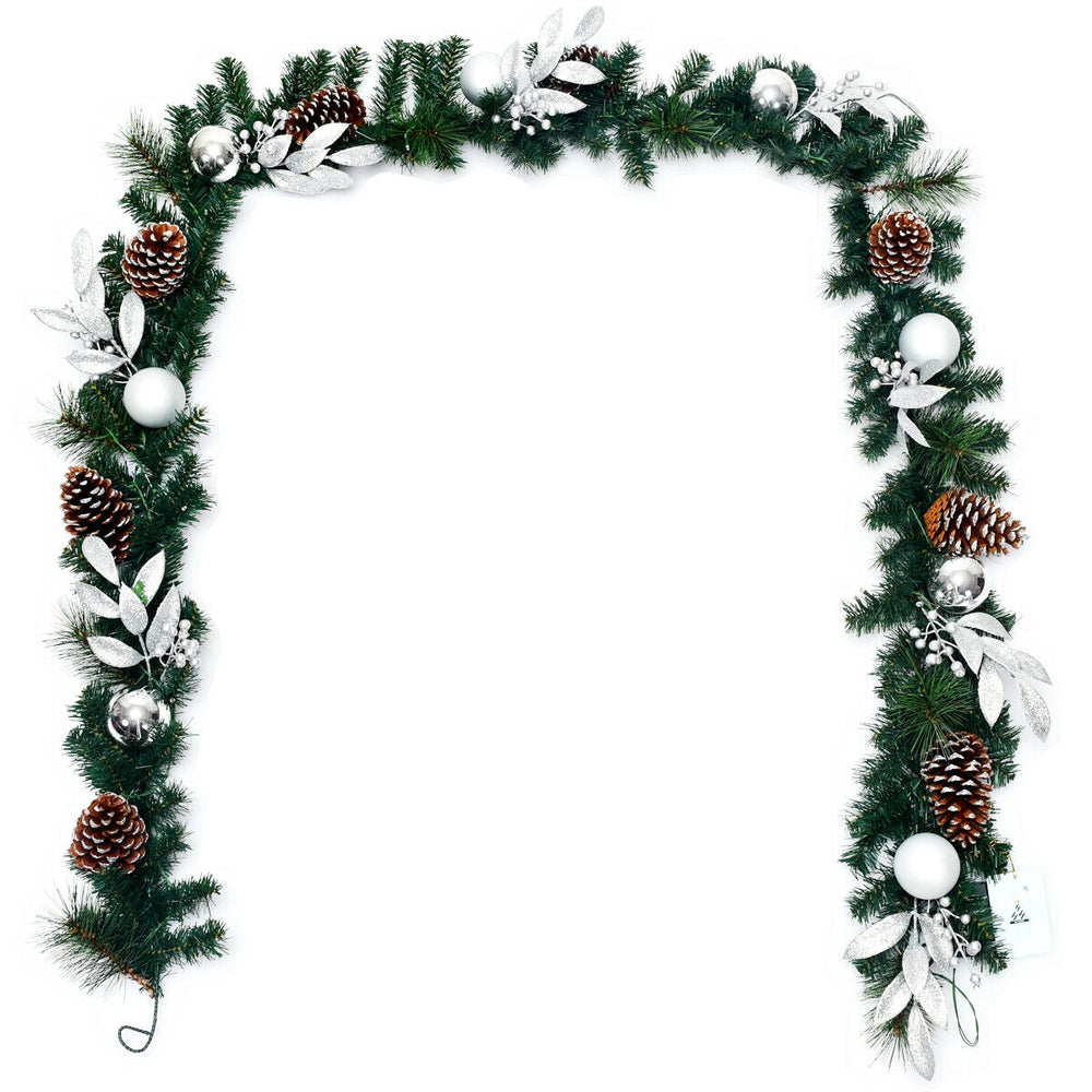 9-foot pre-lit artificial Christmas garland with 50 warm white LED lights, pinecones, and silver accents for festive.