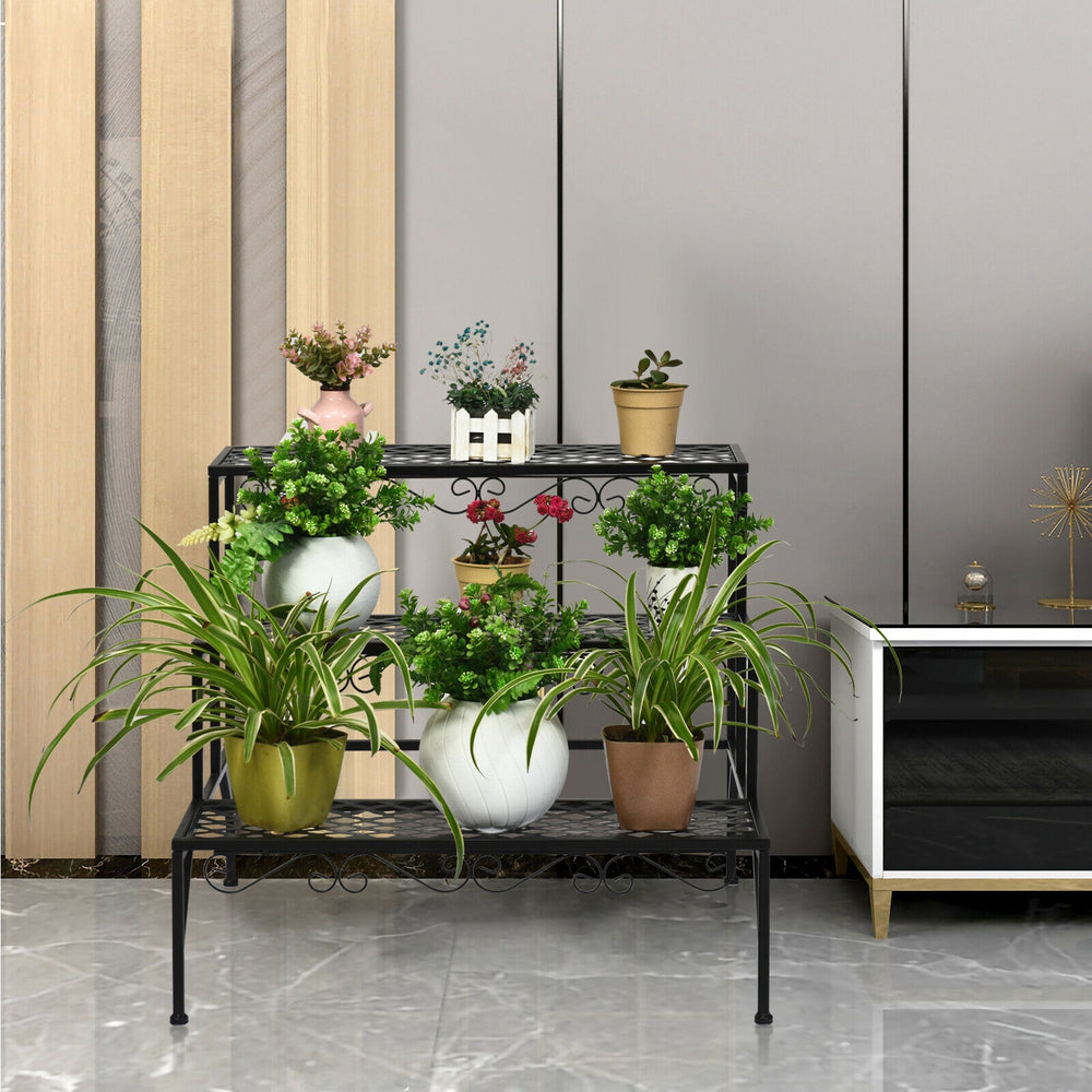 Ladder-shaped 3-tier metal plant stand showcasing vibrant plants, ideal for enhancing indoor or outdoor decor.