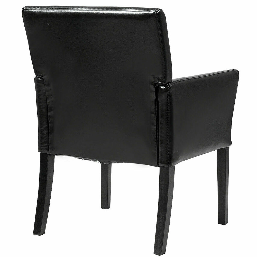Black PU leather executive arm chair with sturdy wood legs and ergonomic back for comfortable seating.