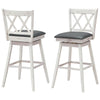 Set of 2 swivel counter height barstools with rubber wood legs and PVC leather cushions for versatile seating.