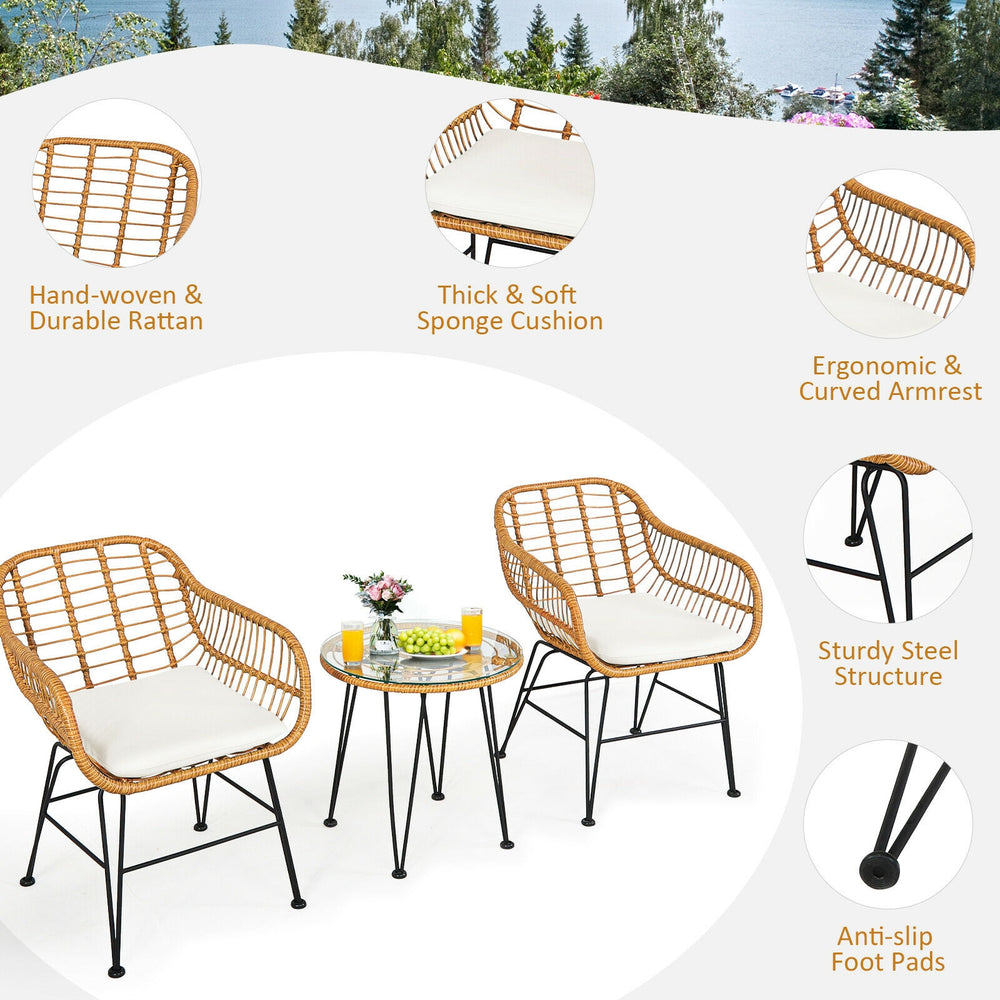 Cushioned rattan chair set with a round table, sturdy steel frame, and anti-slip foot pads for outdoor relaxation.