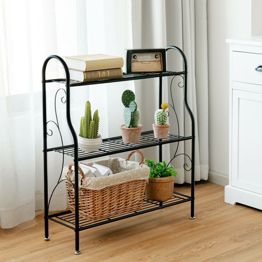 Black 3-tier metal plant stand with scrollwork design, ideal for organizing plants and decor in any space.