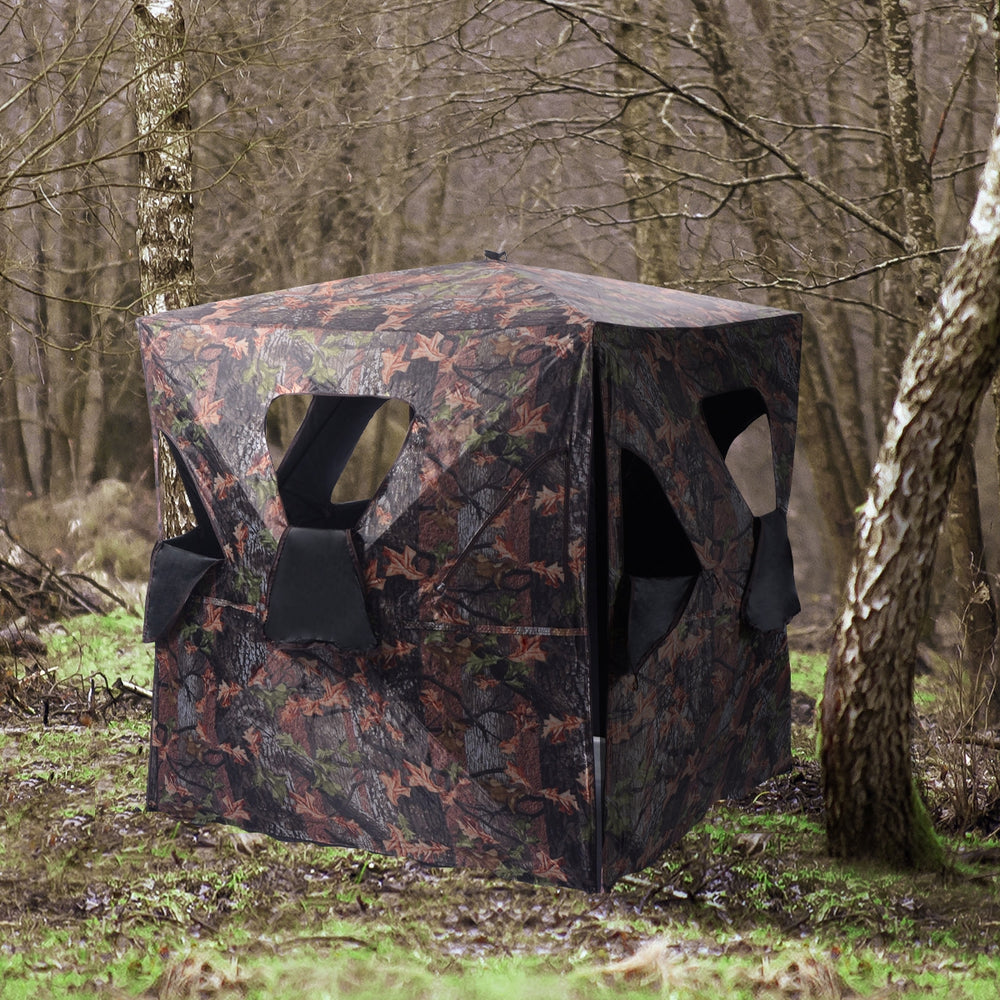 Portable deer hunting blind with camo design, featuring six full view windows for 360-degree visibility in the field.