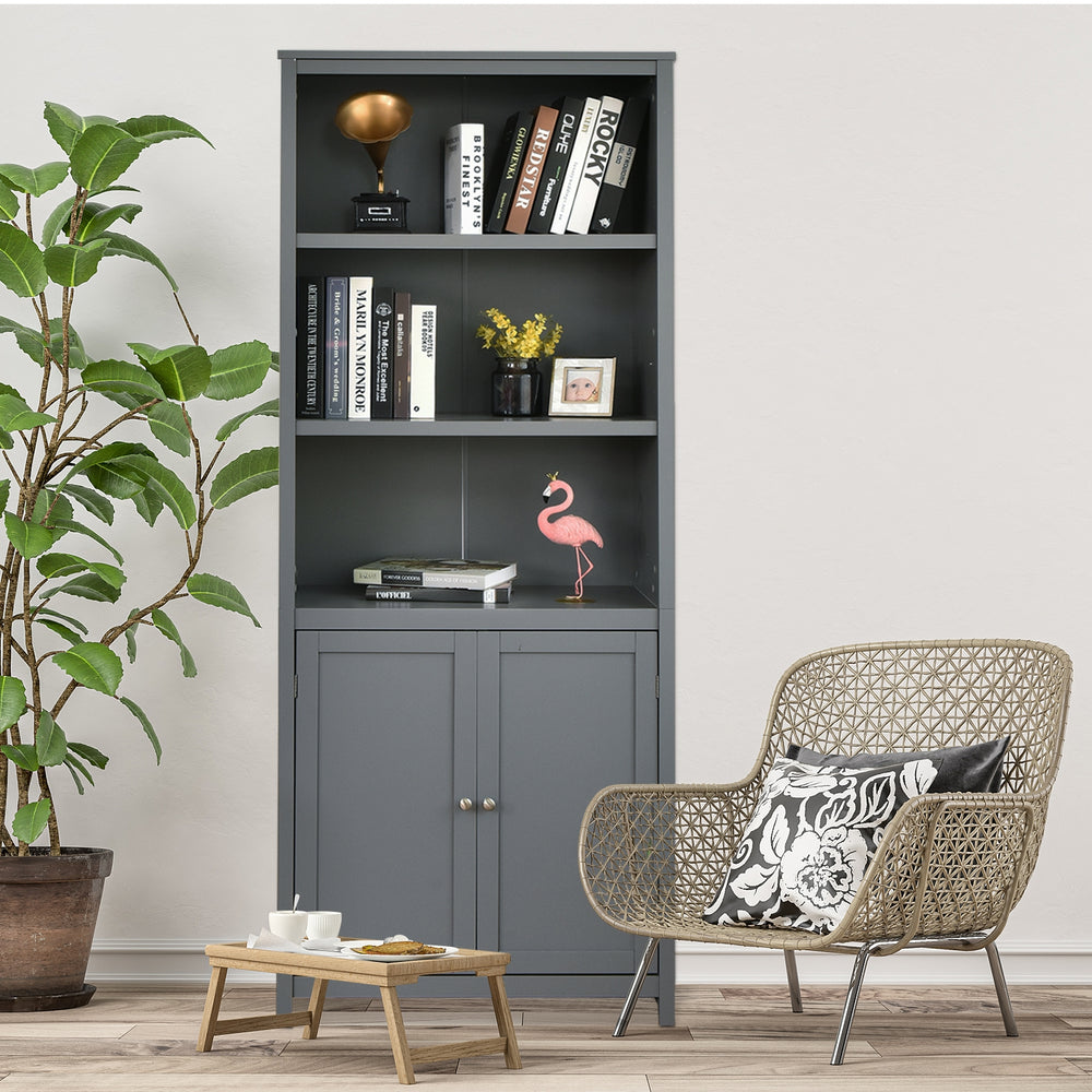 Gray bookcase shelving unit with adjustable shelves and bottom cabinet, perfect for organizing books and decor.