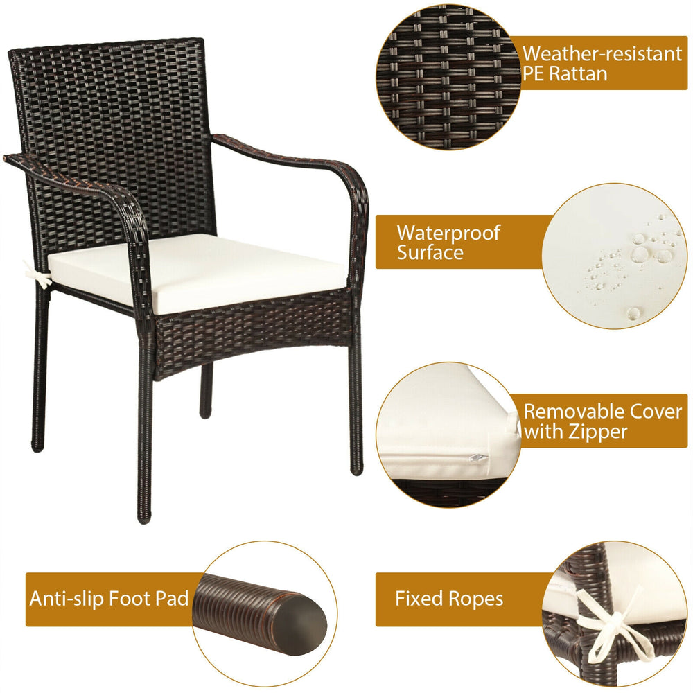 Single stackable patio rattan dining chair with waterproof cushion and anti-slip foot pads, ideal for garden and patio.