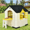 Kid’s playhouse with yellow accents, made from durable HDPE, features open doors and windows for indoor and outdoor fun.