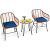 Navy cushioned rattan armchair with iron legs, ideal for stylish outdoor seating on the balcony or patio.
