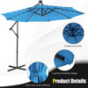 Blue 10 feet patio solar-powered cantilever umbrella with tilting system and 32 LED lights for outdoor relaxation.