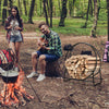 A 30-inch tubular steel log hoop firewood storage rack with a black finish, ideal for outdoor or indoor use.