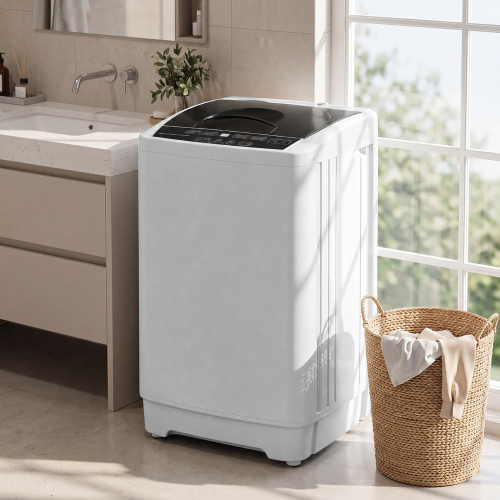 Compact gray 9.93 lbs full automatic washing machine with recessed handles and a honey-comb stainless steel tub for easy portability.