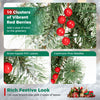 Close-up of red berries among snow-frosted PVC leaves on the 9 FT Christmas garland with 180 branch tips.