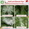 Close-up of flocked pine needles and green PVC leaves on a 6/7.5/9 FT artificial Christmas tree with warm-white LED.
