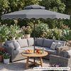 Gray 9-foot patio umbrella with push-button tilt and crank, featuring ruffled scallops for elegant outdoor shade.