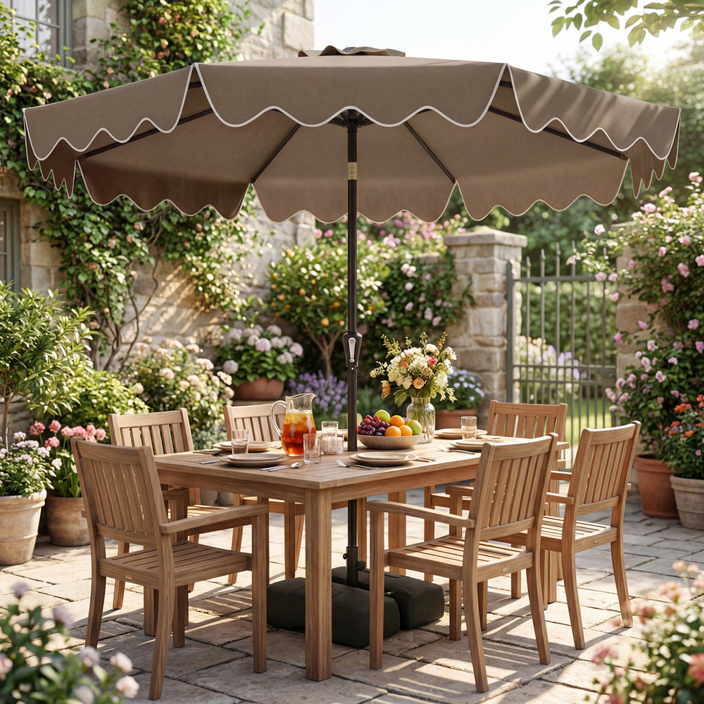 9 feet brown patio umbrella with ruffled edges and weighted base, providing shade for outdoor dining and gatherings.
