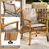 Curved armrests and breathable fabric enhance comfort in this acacia wood outdoor dining chair with adjustable foot pads.