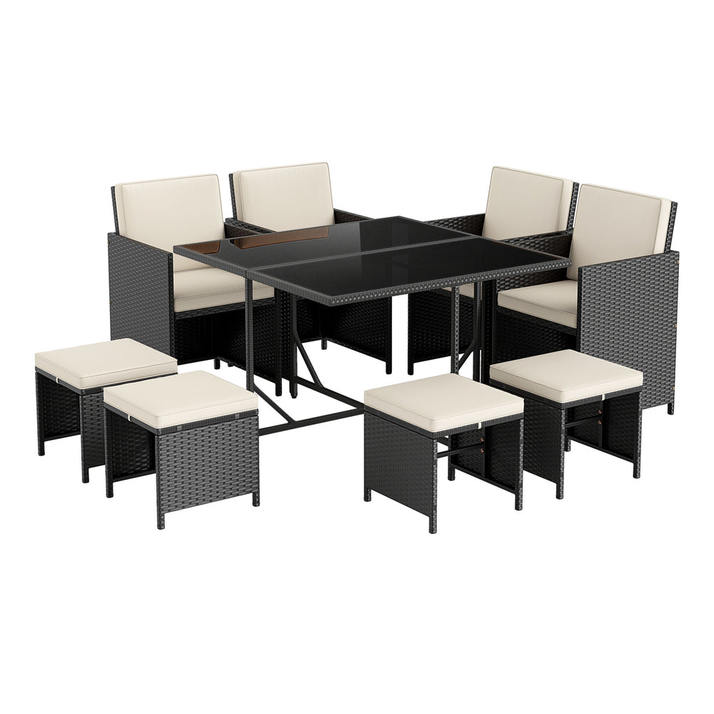 9-piece patio dining set featuring a tempered glass table, black PE rattan, and comfortable cushions for outdoor.