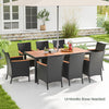 9-piece outdoor dining set featuring an acacia wood tabletop and supportive PE rattan chairs, perfect for patio dining.