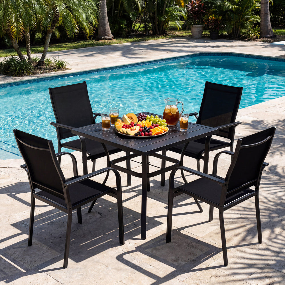 5-piece black patio dining set featuring a square table and stackable chairs, perfect for outdoor meals by the pool.