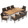 Top view of the 9-piece patio dining set showcasing a natural acacia wood table with PE wicker chairs and cushions.