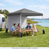 Pop up 9 ft x 9 ft gray canopy tent with sidewall, ideal for outdoor parties, featuring a sturdy metal frame and easy setup.