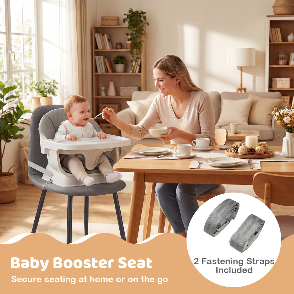 Baby booster seat with fastening straps, featuring a soft cushion and solid wood legs for secure seating at home or on.