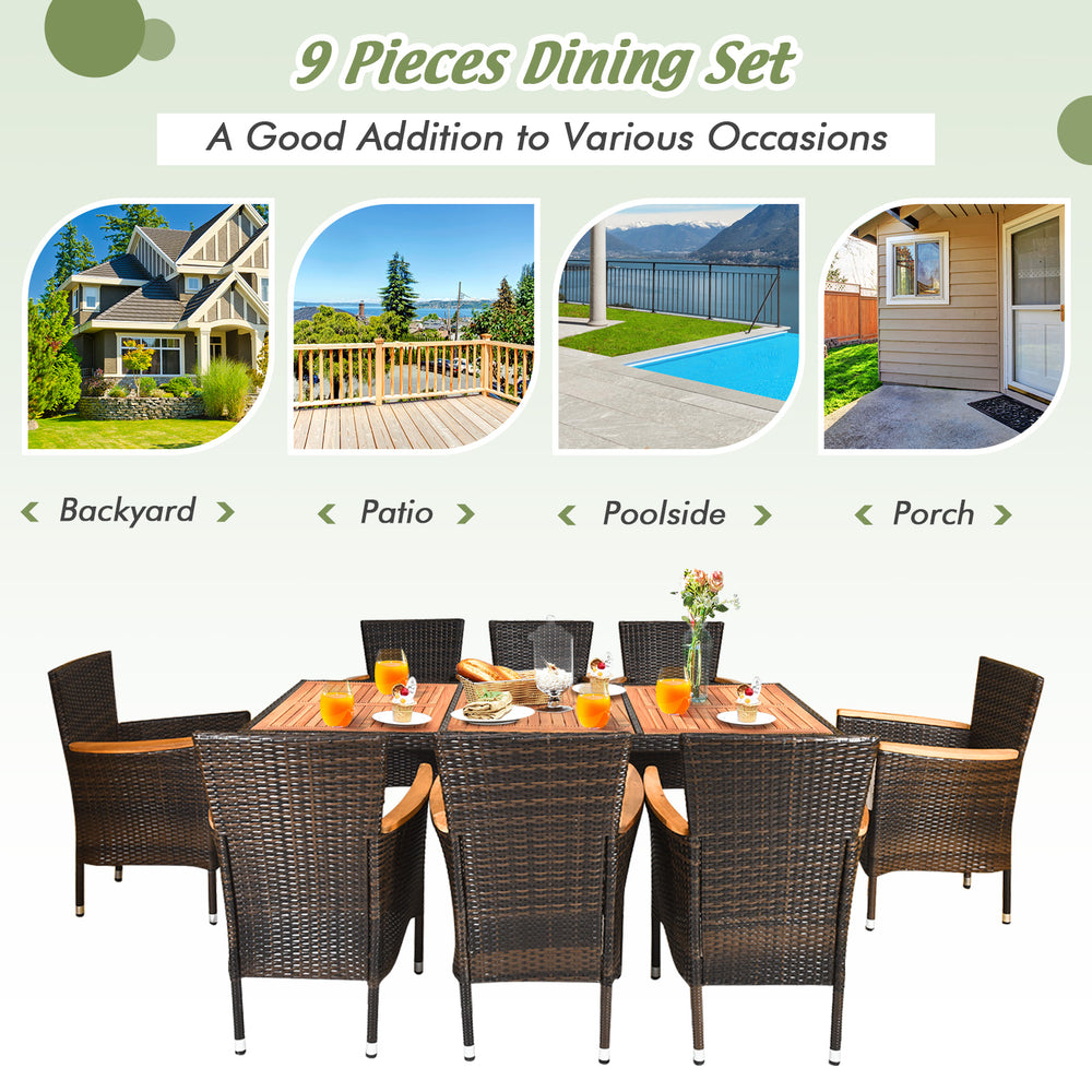 9 pieces rattan dining set featuring an acacia wood table and stackable cushioned chairs, ideal for outdoor gatherings.