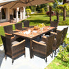 Close-up of the acacia wood tabletop on a rattan dining set, showcasing its rich texture and durability for outdoor.