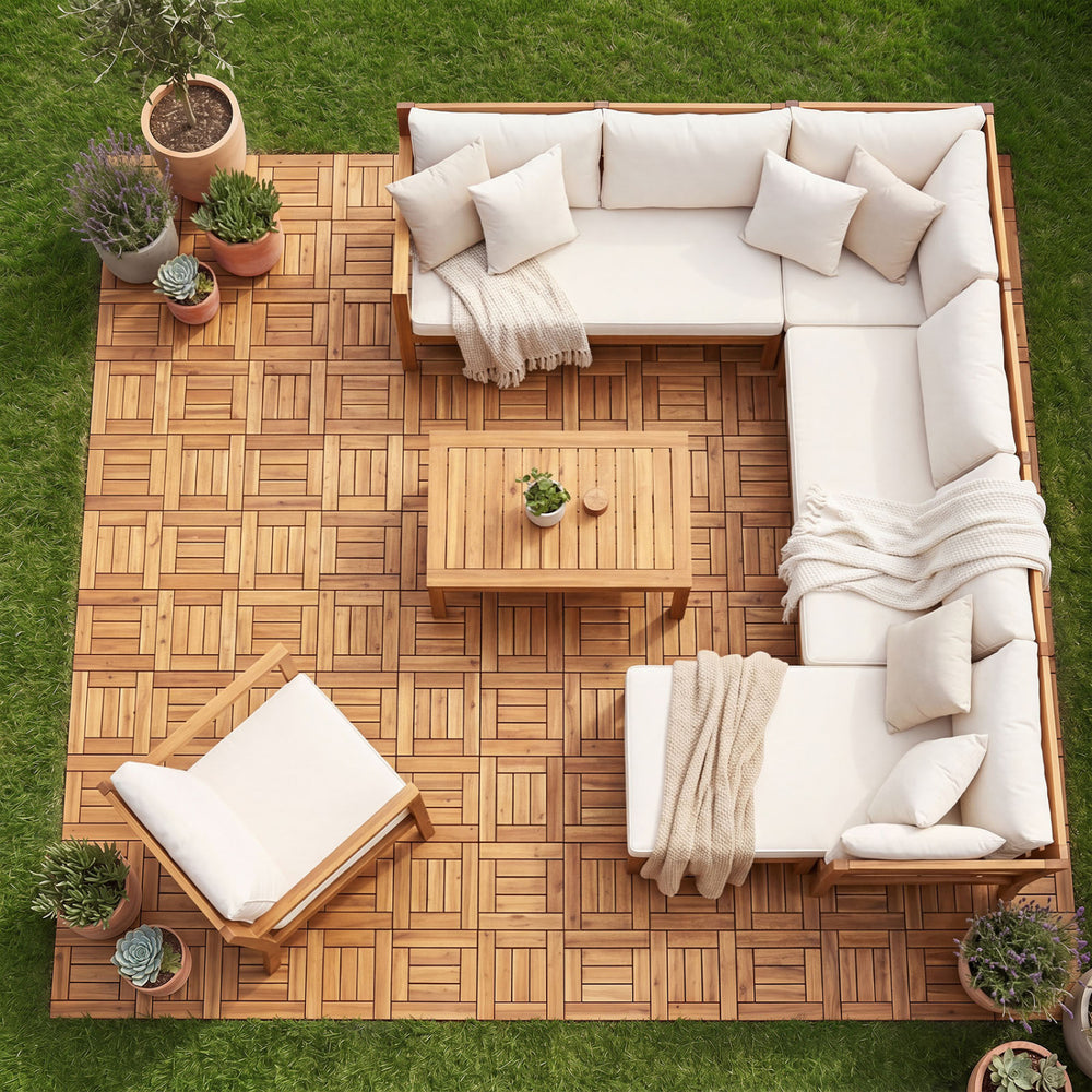 Acacia wood interlocking deck tiles arranged on a patio, showcasing natural beauty and easy assembly for outdoor use.