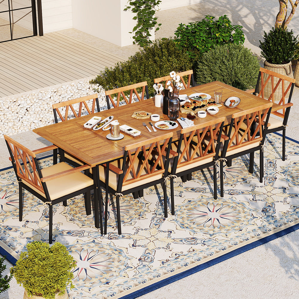 Acacia wood outdoor dining set with 8 chairs, featuring a spacious table and soft padded cushions for patio gatherings.