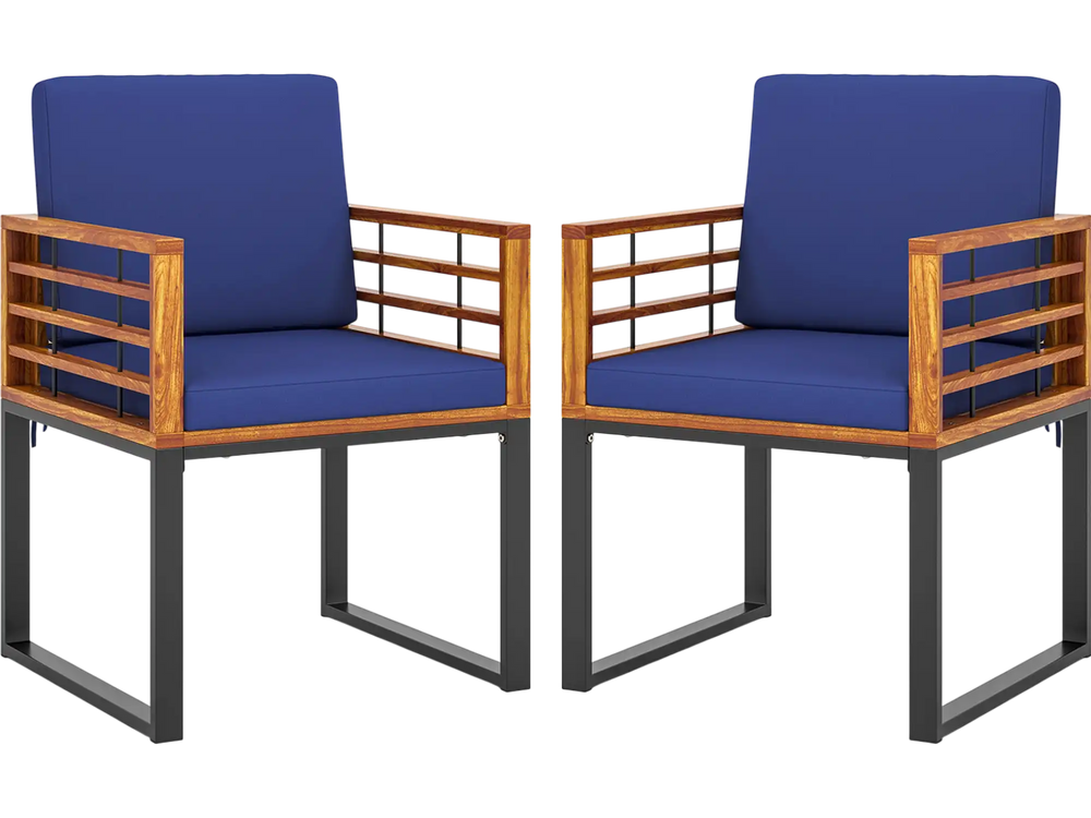 Set of 2 acacia wood outdoor dining chairs with navy soft cushions, featuring a sturdy metal frame and cozy armrests.