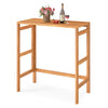 Acacia wood outdoor bar table with slatted tabletop, foldable design, ideal for balcony or patio use.