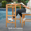 Acacia wood outdoor bar table with slatted tabletop and built-in footrest, perfect for balcony or patio use.