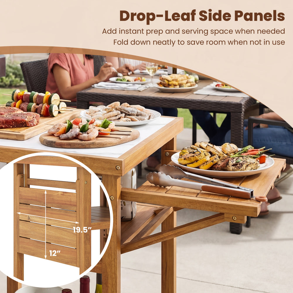 Acacia wood outdoor grill table with faux marble top and drop-leaf side panels, perfect for prep and serving space.