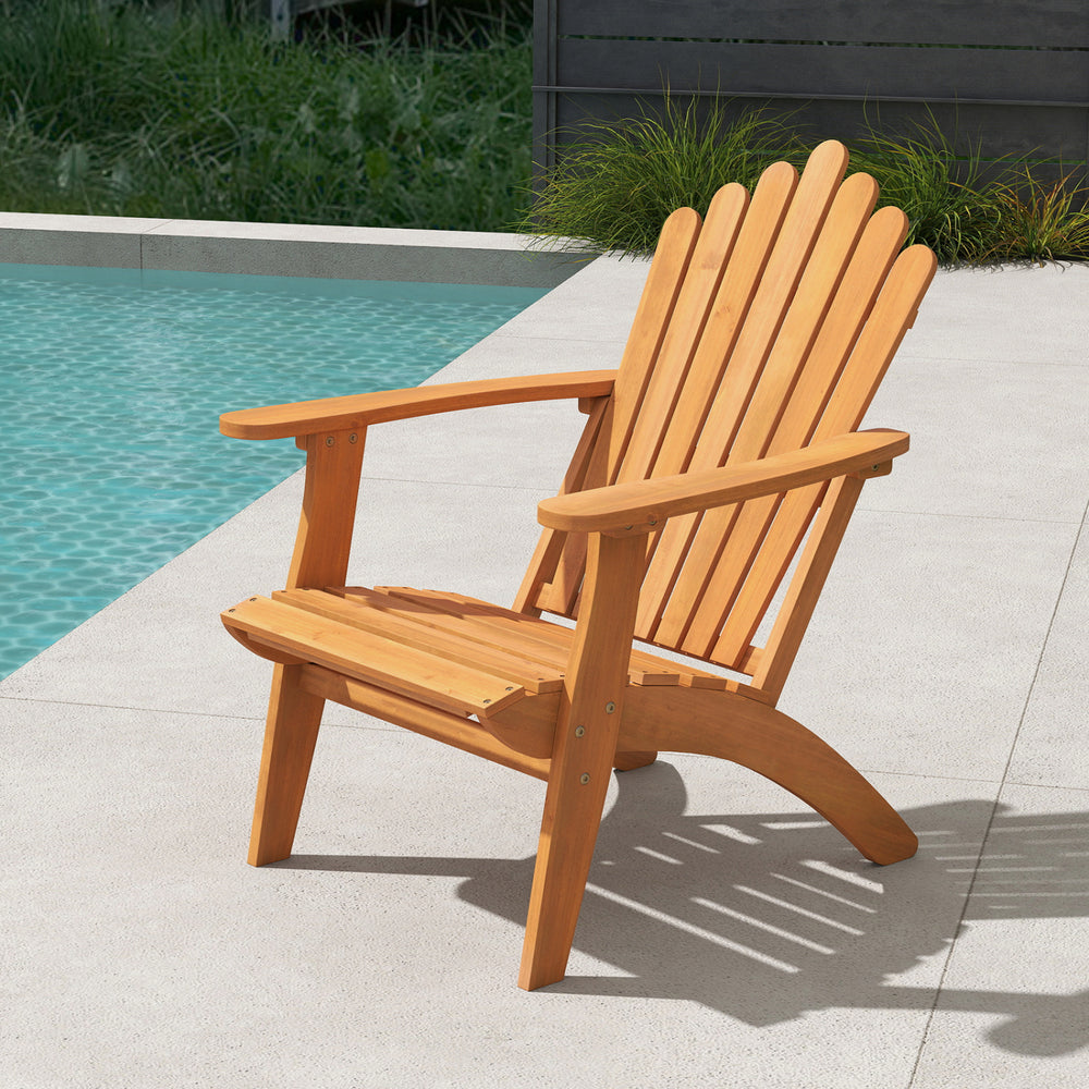 Acacia wood outdoor patio chair with angled backrest and wide armrests, designed for comfort and stability by the.