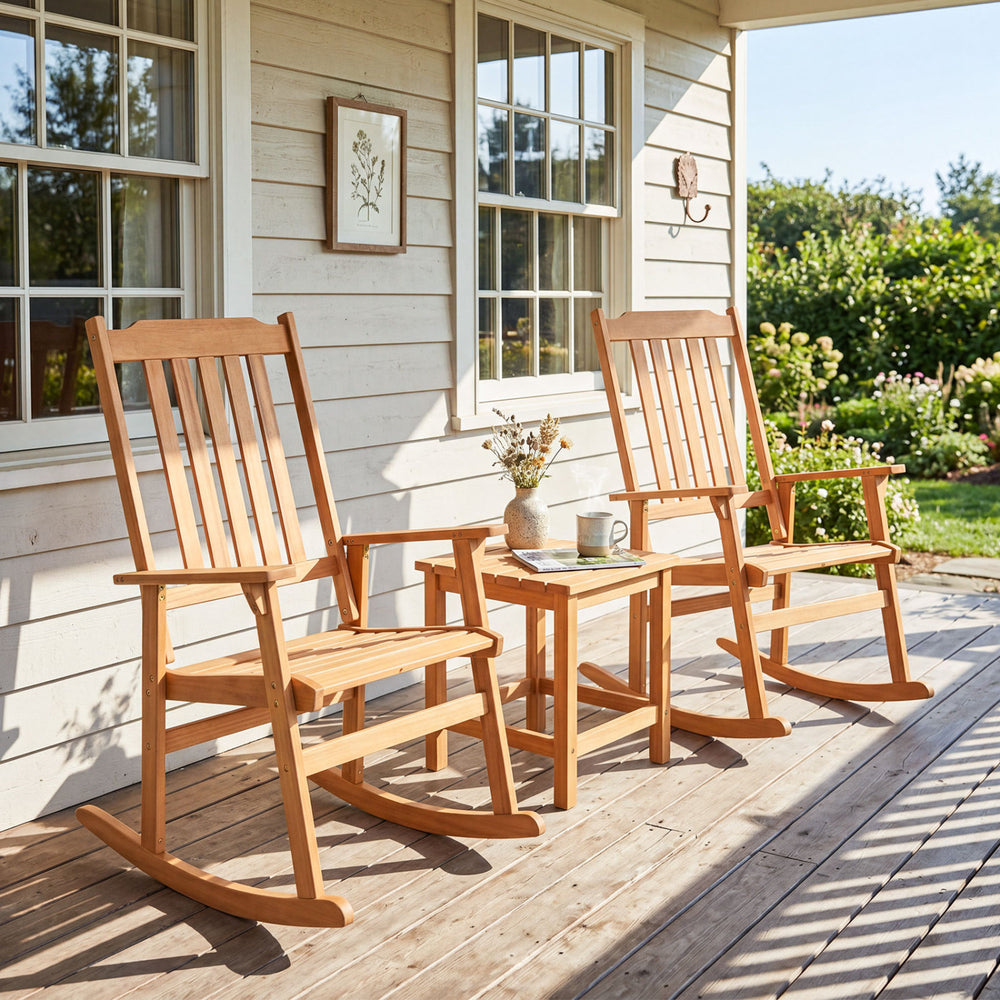 Oversized acacia wood rocking chairs with high backs and armrests, perfect for outdoor relaxation on porches or decks.