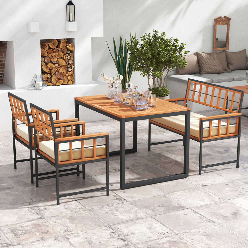 4-piece acacia wood patio dining set with soft cushions, featuring a rectangular table, ideal for outdoor gatherings.