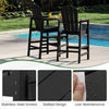 Bar height Adirondack chair set in black with slatted design, ideal for poolside relaxation and outdoor gatherings.