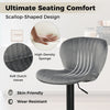 Adjustable gray velvet counter height chair with scallop-shaped design, 360° swivel, and ergonomic footrest for comfort.