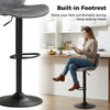 Adjustable gray counter height chair with velvet upholstery and built-in footrest, ideal for home bars and dining rooms.