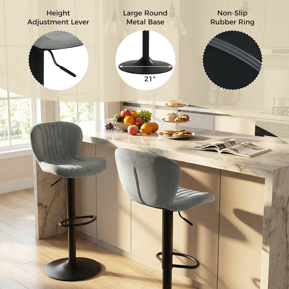 Adjustable gray velvet counter height chair with a round metal base, designed for comfort and stability in modern.