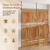 Adjustable floor-to-ceiling clothes rack in black with 4 hanging rods, perfect for organizing T-shirts and jackets.